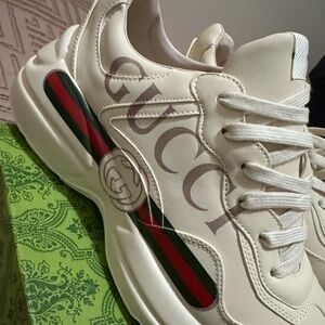 Stylist Off-White Sneakers with Red and Green Accents